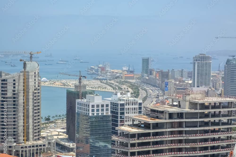 Aerial view of downtown Luanda, bay and Port of Luanda, marginal and central buildings, in Angola