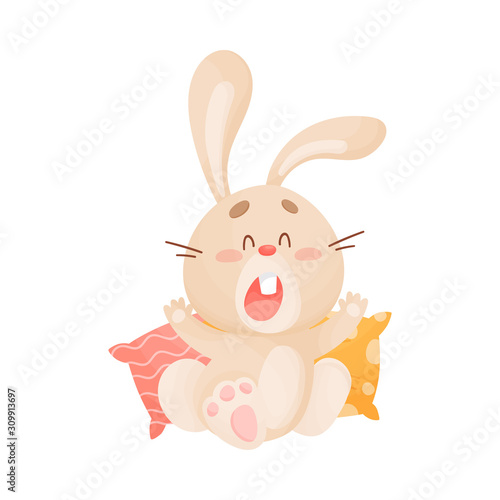 Cartoon Sleepy Hare Sitting on Pillow and Yawning Vector Illustration