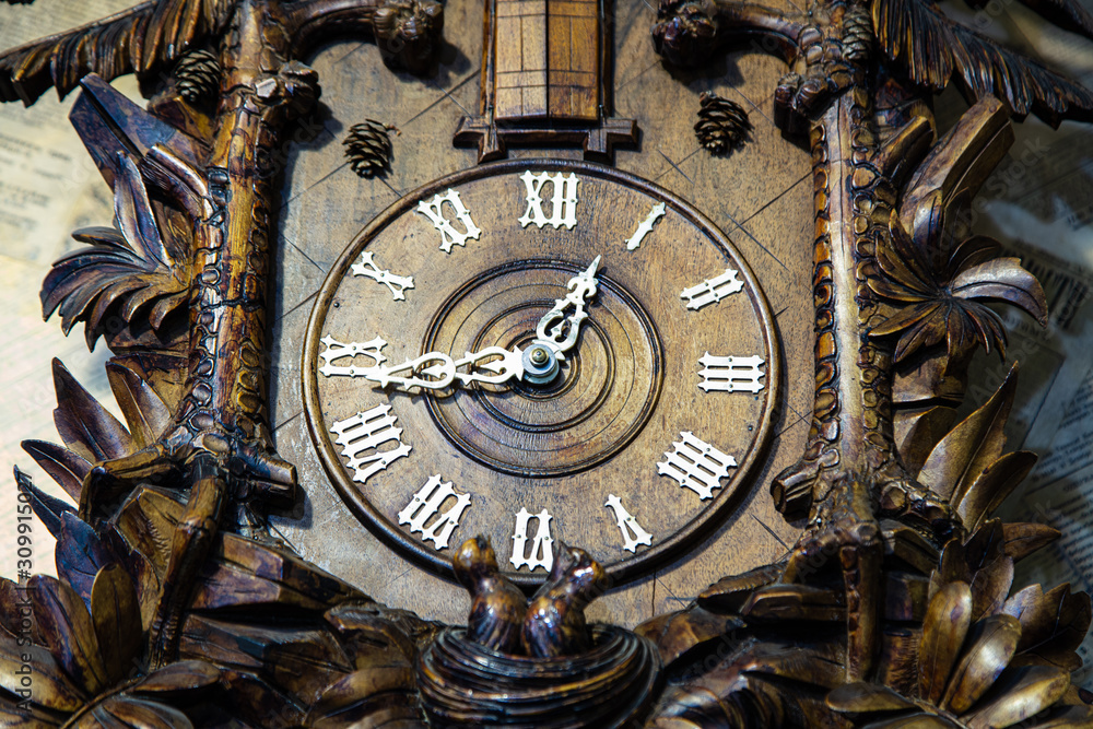 Fototapeta premium Pan Zavarkin ta Sin (Mr. Zavarkin and Son) Cafe-Museum. Closeup of ancient clock