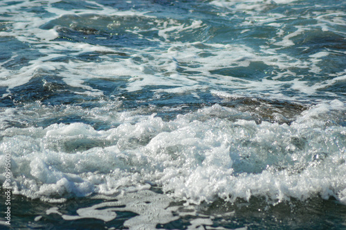 Photograph of seawater surface. Water texture.