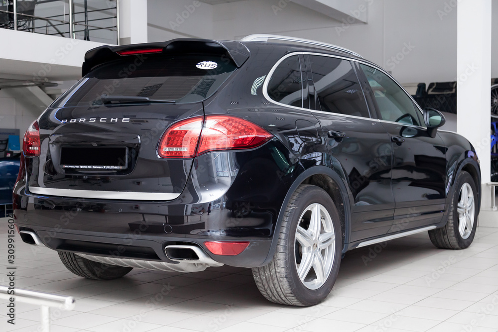 Rear view of Porsche Cayenne Diesel 958 2012 in black color after cleaning  before sale in a sunny summer day Stock Photo | Adobe Stock