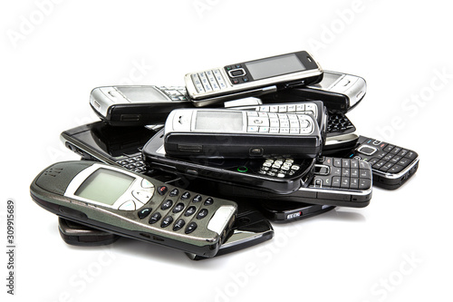 Pile of old mobile phones ready for recycling