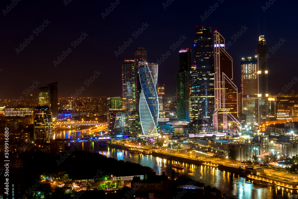 Moscow. Russia. Skyscrapers in Moscow at night. Cityscape at night. Panorama of the capital. High-rise buildings on Presnenskaya embankment. Traveling around Moscow. Regions of Russia. Attractions