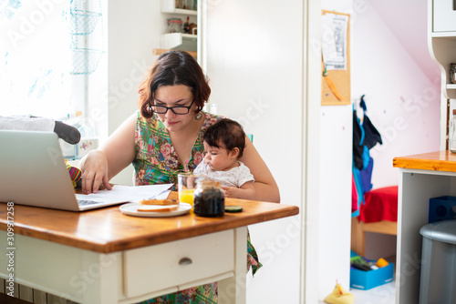 Single mother working from home © Stock Rocket