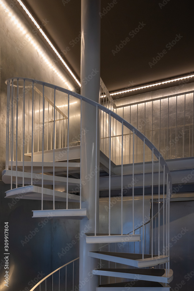 Fototapeta premium Spiral steel staircase circular decoration exterior building architecture