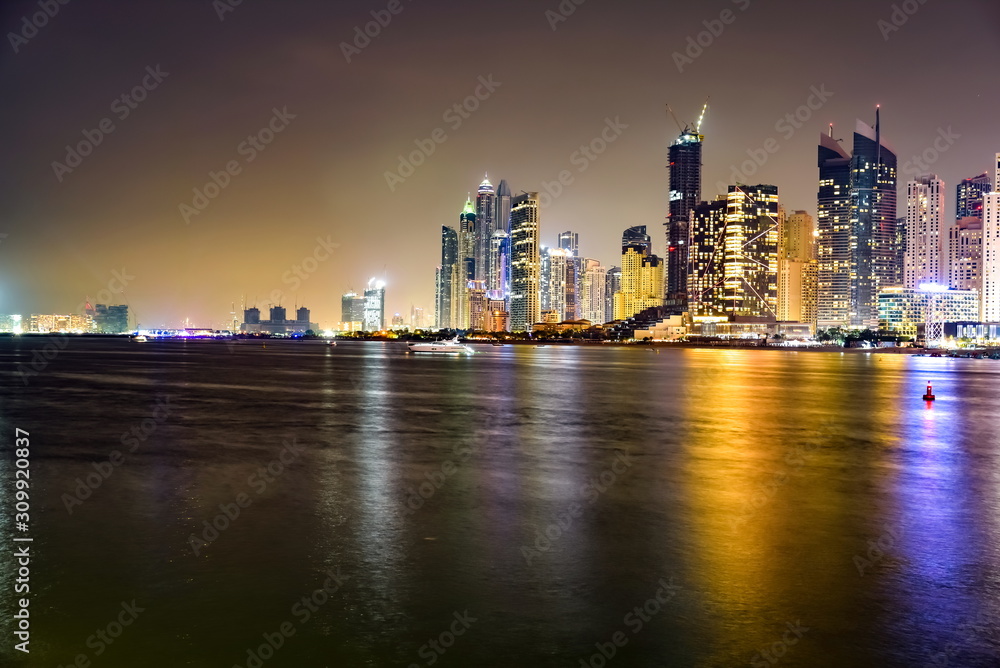 Naklejka premium Dubai Skyline view at night, Dubai, United Arab Emirates