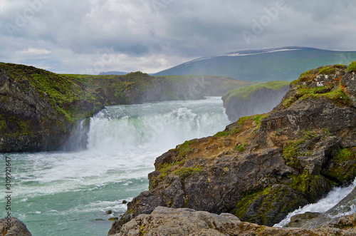 The Power and magic of powerful Iceland Godafoss Waterfall Cascade with beautiful nature and landscape