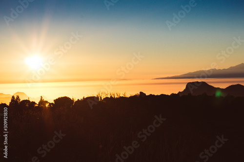 Amazing view sunset at Roque Nublo park and Teide peak