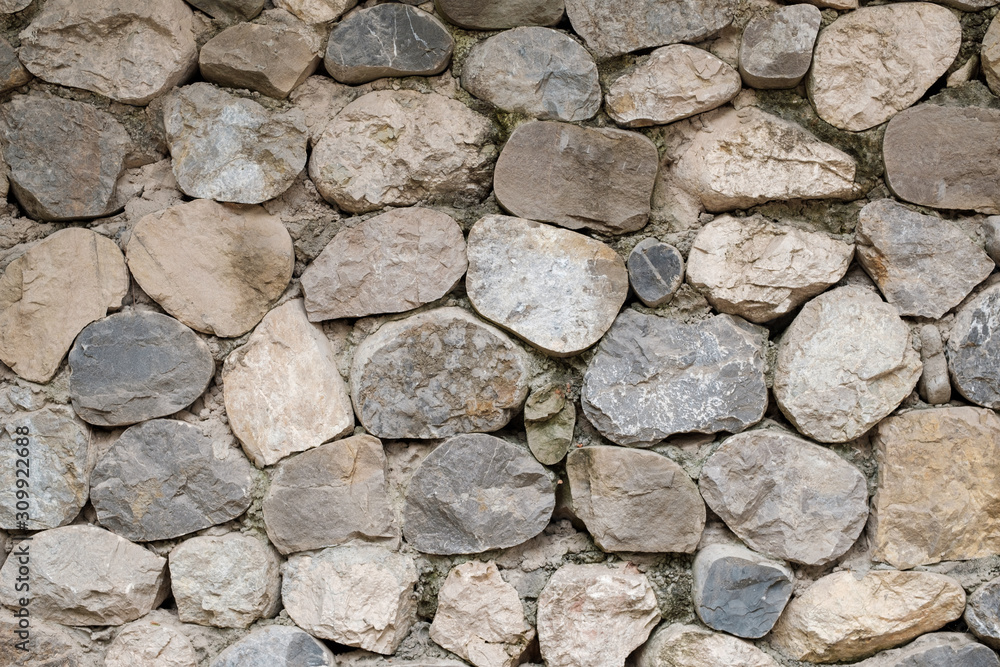 wall texture background of cut stones on concrete base wall texture background of cut stones on concrete base