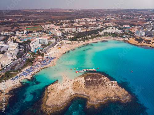 Beautiful aerial view of the most famous beaches in Cyprus - Nissi Beach, Landa beach, Pantachou Beach photo