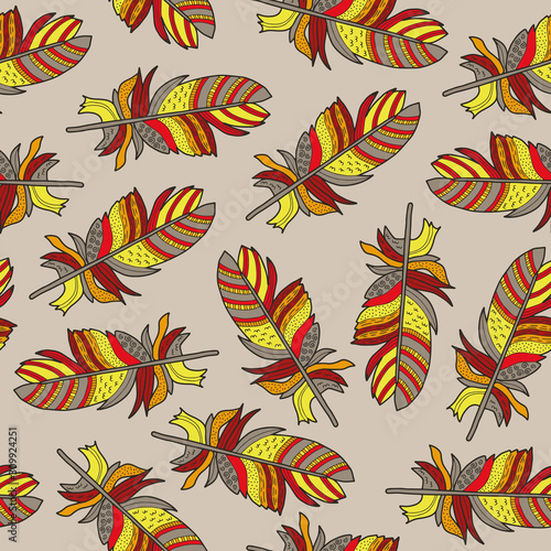 Vector feather pattern in brown, yellow, red. Simple colorful plume hand drawn made into repeat. Great for background, wallpaper, wrapping paper, packaging, fashion.