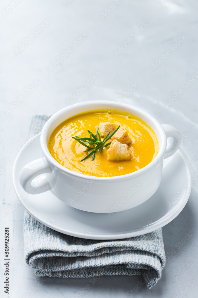 Seasonal spicy fall autumn creamy pumpkin and carrot soup Seasonal spicy fall autumn creamy pumpkin and carrot soup