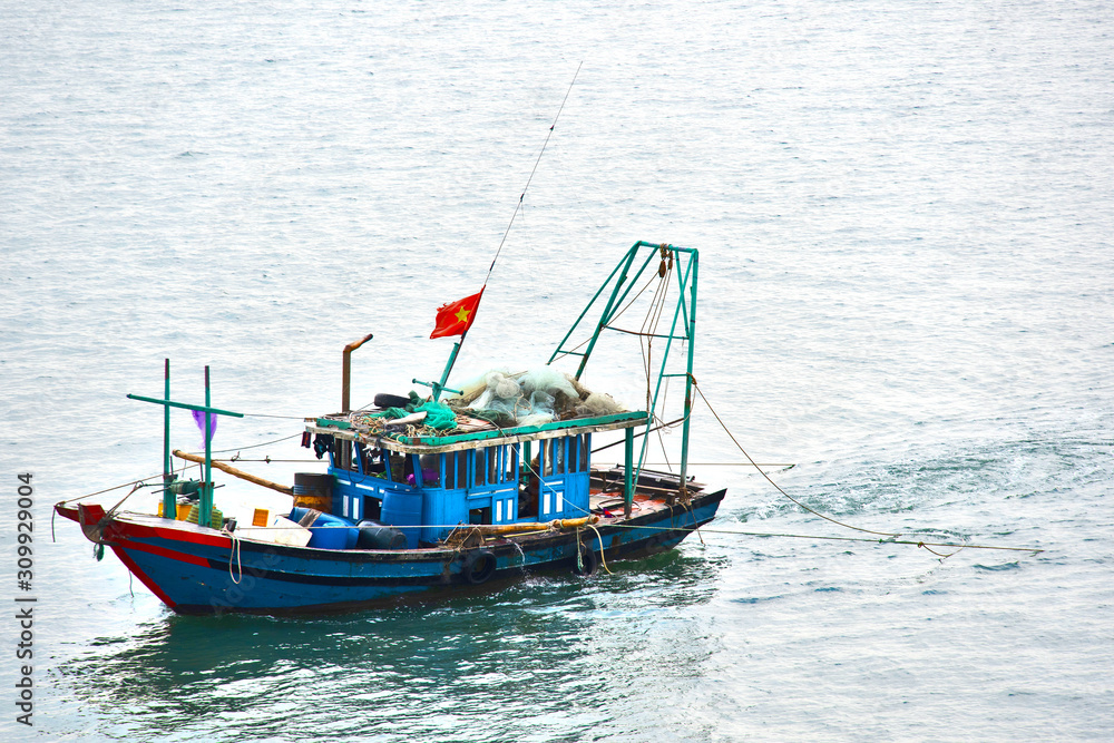 Local Fishing Boat in Ha Long Bay, Vietnam