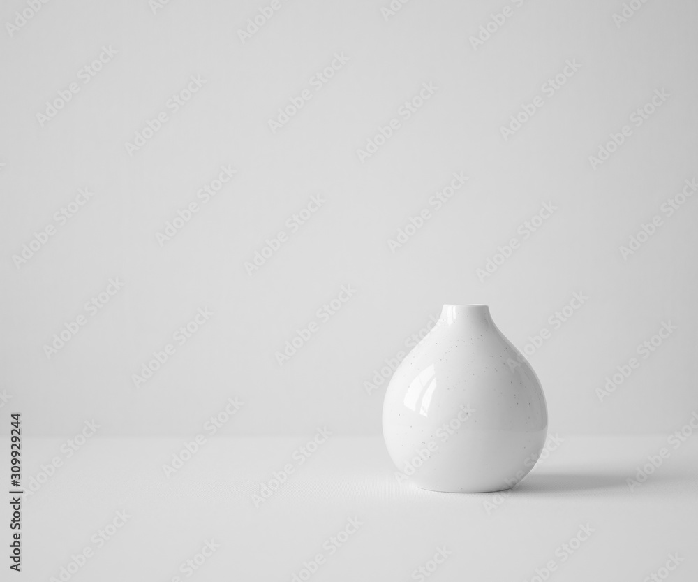 white vase on table - obrazy, fototapety, plakaty 