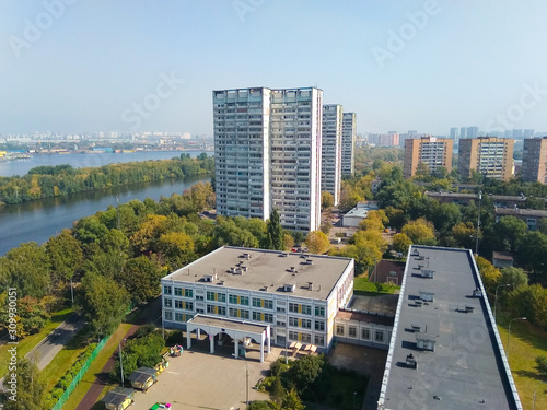 Top view of the Moscow high school building and the river. photo