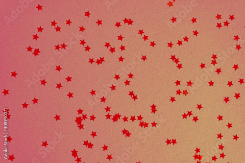 Abstract warm red  coral background with red little stars on it  for brochure  invitations. Holidays and new year  christmas conept.