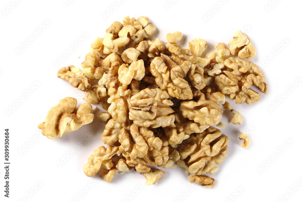 Walnut kernels, pile isolated on white background, top view Walnut kernels, pile isolated on white background, top view