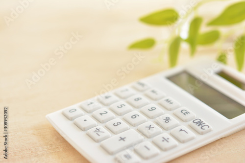 Calculator on a wooden desk 