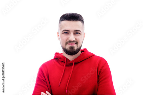 Handsome man in red casual clothes posing on white background