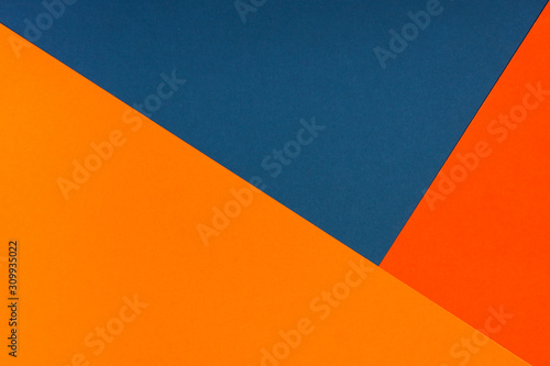 Abstract geometric paper background. Trendy blue and orange colors, active lines.
