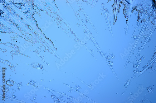 blue ice glass background  abstract texture of the surface of the ice on the glass  frozen seasonal water