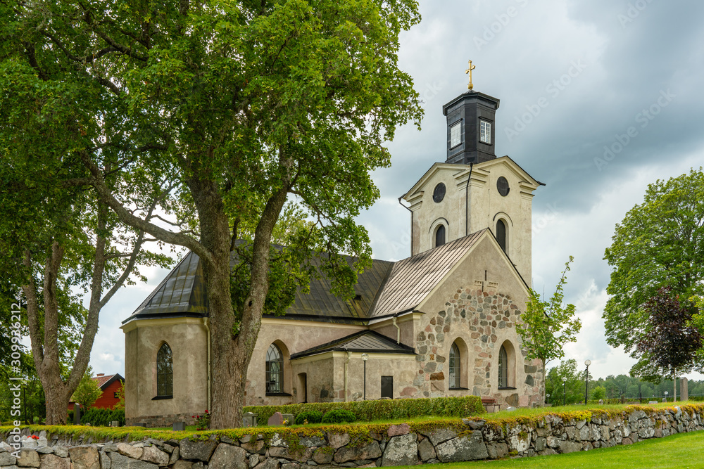 Swedish medieval church in summer sunlight