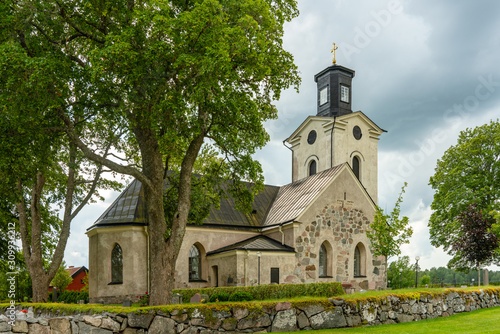 Swedish medieval church in summer sunlight