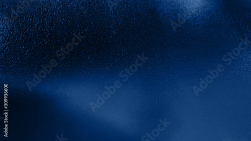 dark blue metal plate. Classic blue color of year 2020