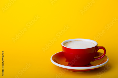 red cup on a  yellow background