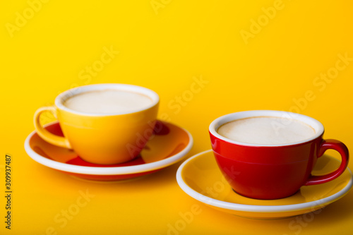 yellow and red cup on a yellow background