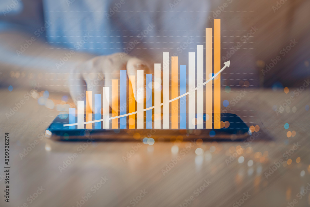 Business analytics and financial concept, Plans to increase business growth and an increase in the indicators of positive growth in 2020 floating above digital screen mobile phone. Business analytics and financial concept, Plans to increase business growth and an increase in the indicators of positive growth in 2020 floating above digital screen mobile phone.