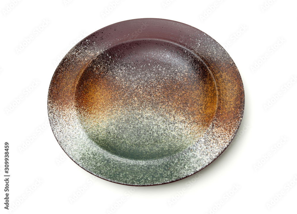 Empty earthenware plate on white background Empty earthenware plate on white background