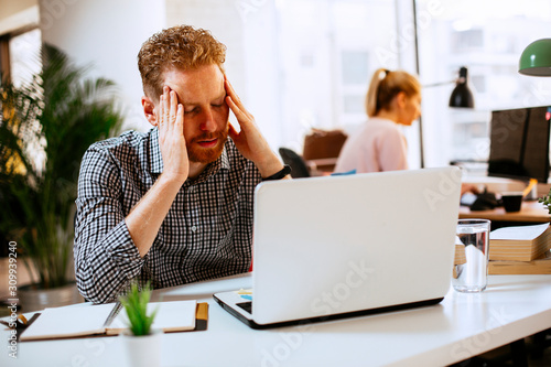 Картината върху платно Businessman made mistake. Worried businessman at office.