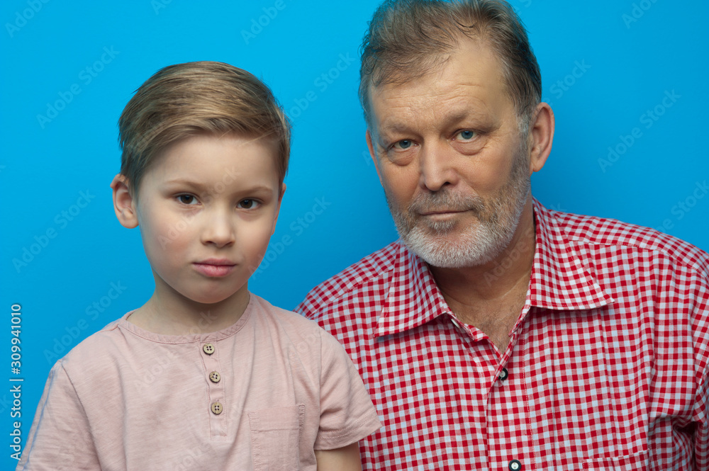 Portrait of cute positive grandfather and grandson Portrait of cute positive grandfather and grandson
