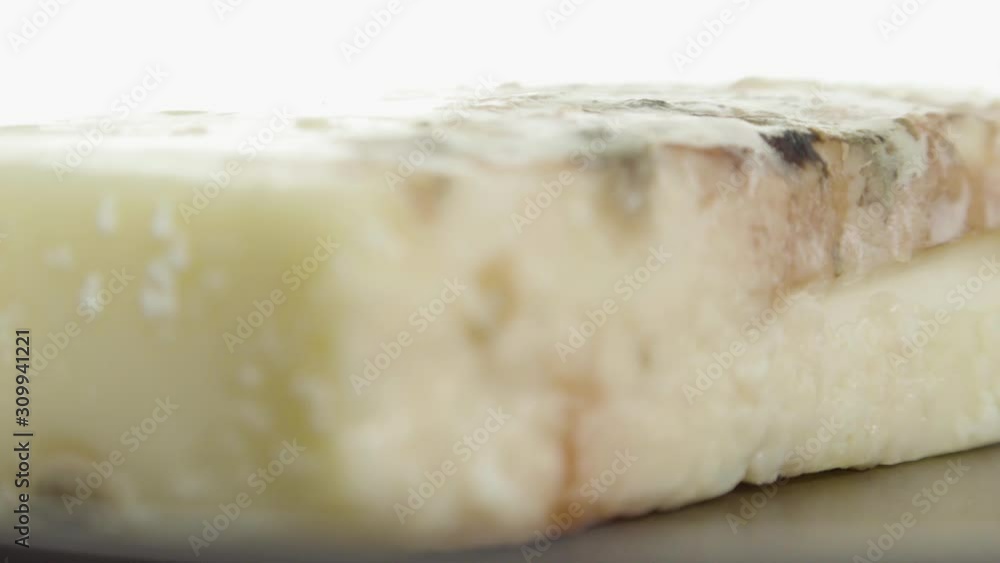 Undesirable mold on cheese which lies on plate Undesirable mold on cheese which lies on plate