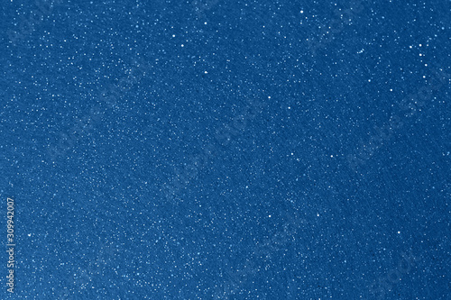 Shiny blue sky glitter background. Christmas abstract background