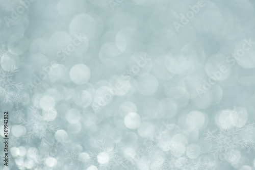 Blue Christmas background with bokeh and snowflakes