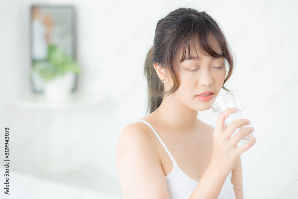 Beautiful portrait young asian woman caucasian smiling with nutrition thirsty and drinking glass of water mineral with fresh and happy, asia girl diet for healthy care and wellness, lifestyle concept. Beautiful portrait young asian woman caucasian smiling with nutrition thirsty and drinking glass of water mineral with fresh and happy, asia girl diet for healthy care and wellness, lifestyle concept.