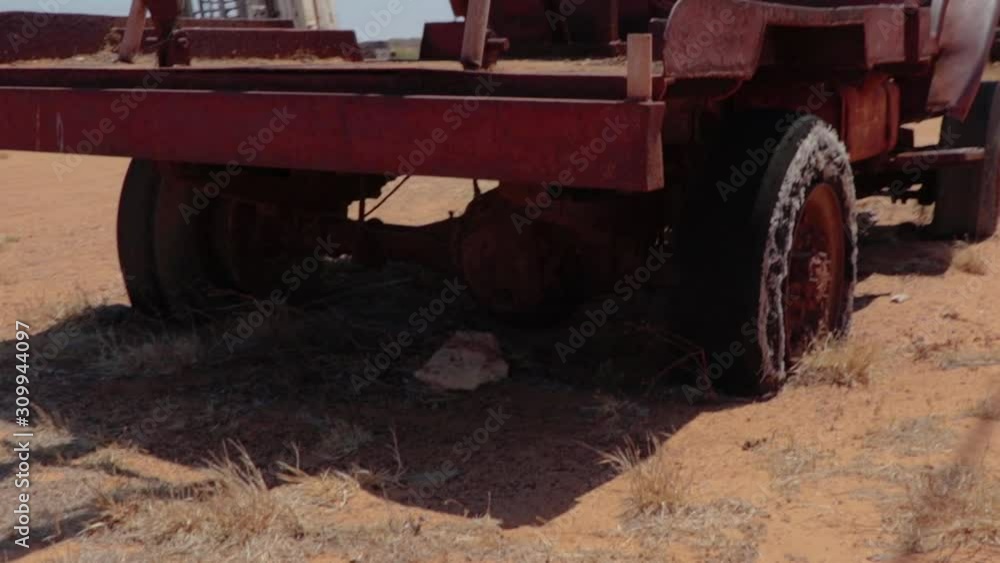 old rusty tow truck in the middle of the desert old rusty tow truck in the middle of the desert