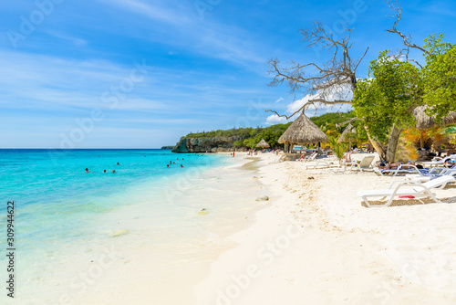 Fototapeta Naklejka Na Ścianę i Meble -  Cas Abao beach - paradise white sand Beach with blue sky and crystal clear blue water in Curacao, Netherlands Antilles, a Caribbean tropical Island
