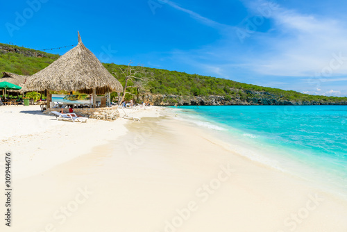 Cas Abao beach - paradise white sand Beach with blue sky and crystal clear blue water in Curacao, Netherlands Antilles, a Caribbean tropical Island © Simon Dannhauer