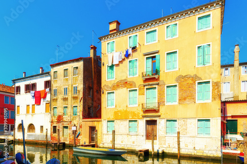 Venice, Italy. Traditional canal street with gondolas and boats © kucherav
