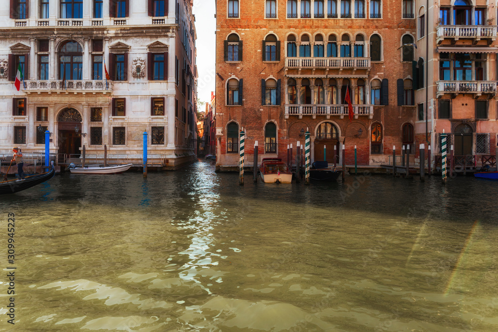 Obraz premium Venice, Italy. Beautiful traditional canal street with colorful houses and boats