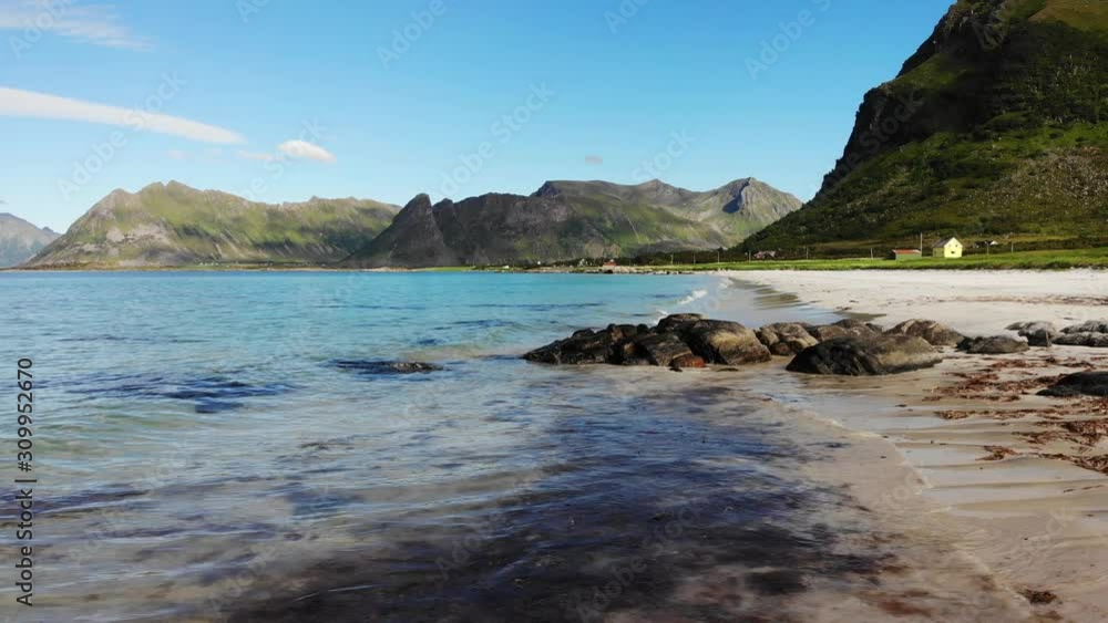 Coast of Gimsoya island, Gimsoysand sandy beach in summer. Nordland county, Lofoten archipelago Norway. Tourist attraction Coast of Gimsoya island, Gimsoysand sandy beach in summer. Nordland county, Lofoten archipelago Norway. Tourist attraction