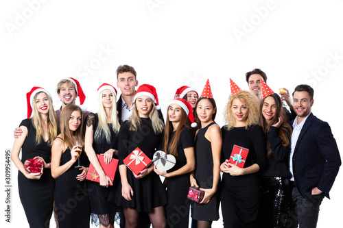 New Year and Christmas, joyful people celebrate the holiday. Group of friends in black classic clothes on a white