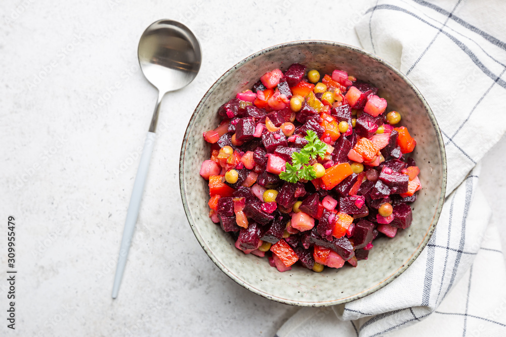 Beet Salad - Vinaigrette in a bowl, top view. Vegan cuisine. Dietary menu.