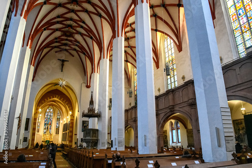 Interior of Lutheran St. Thomas Church Thomaskirche in Leipzig  Germany. November 2019