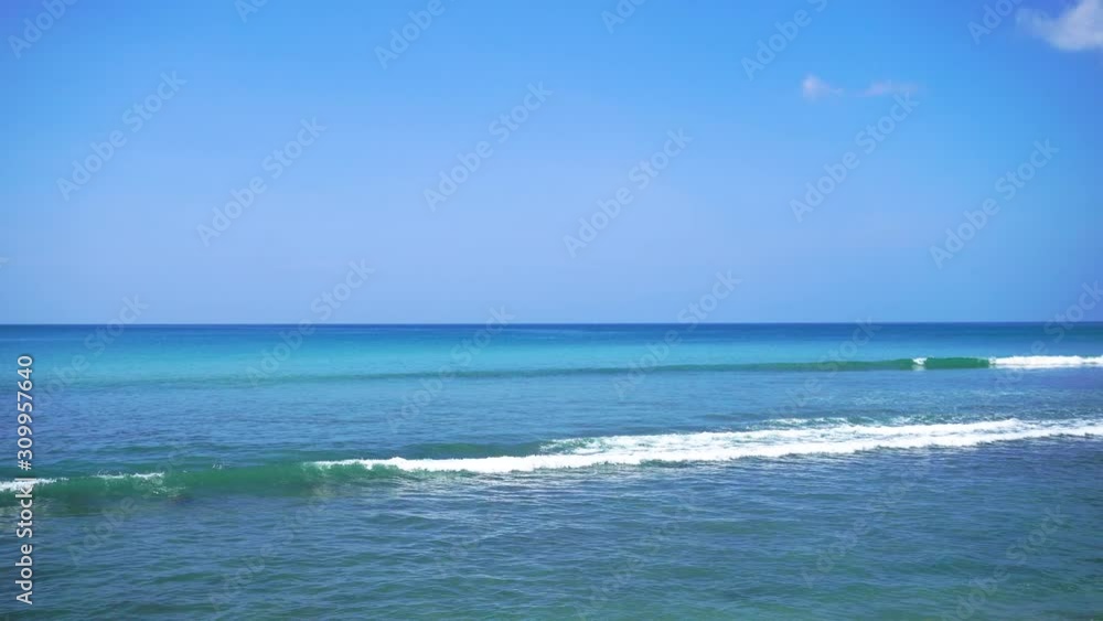 Beautiful tropical beach with blue sky and white cloud background. Summer vacation and nature environment concept. Beautiful tropical beach with blue sky and white cloud background. Summer vacation and nature environment concept.