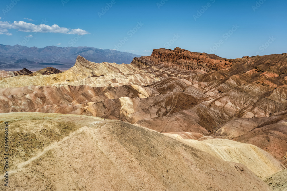 Fototapeta premium Zabriskie Point, is a short walk uphill from the parking area. Located east of Furnace Creek on Hwy 19, Death Valley, USA