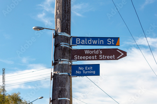 The steepest street in the world sign, Baldwin street in Dunedin, New Zealand photo